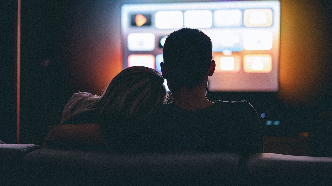 couple, dark room, watching