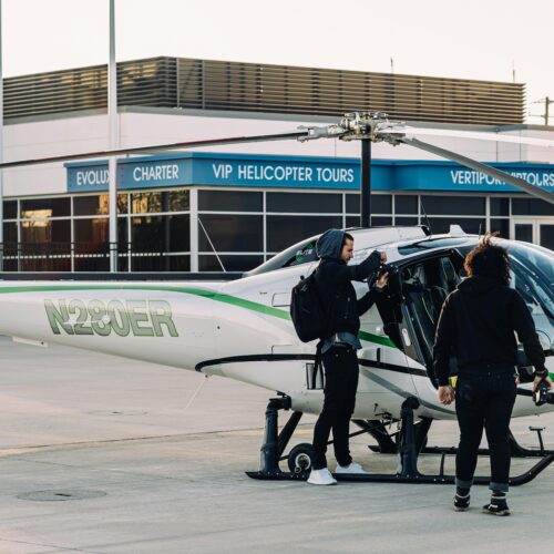 People Standing Near Helicopter