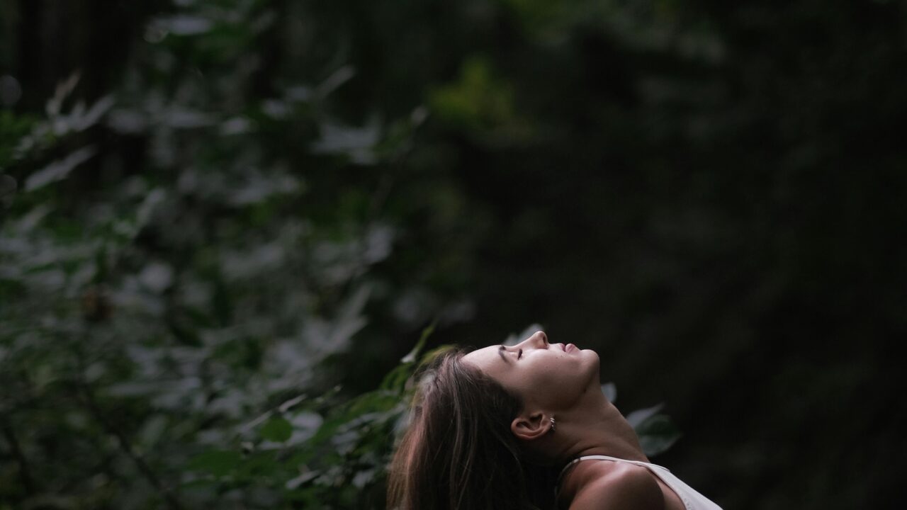 Woman Relaxing in Forest