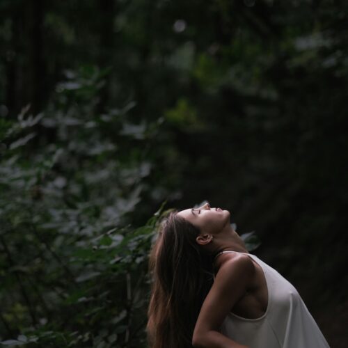 Woman Relaxing in Forest