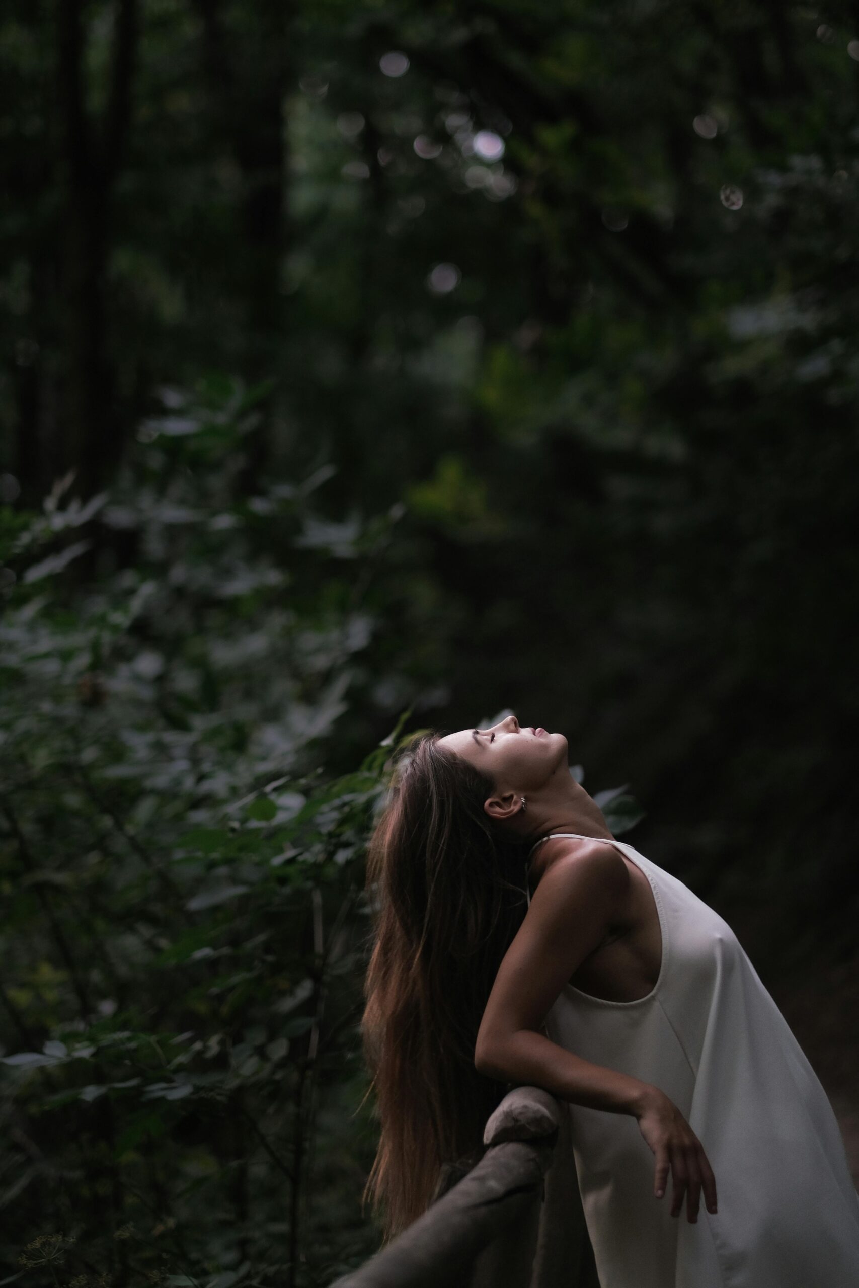 Woman Relaxing in Forest