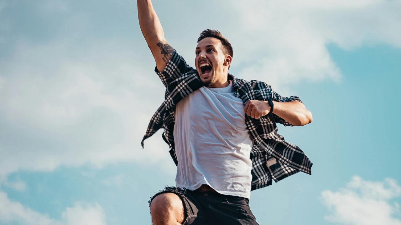 Low Angle Photography of Man Jumping